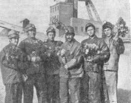 Комсомольско-молодежная бригада подземного рудника, возглавляемая В, Н. Федоровским. 